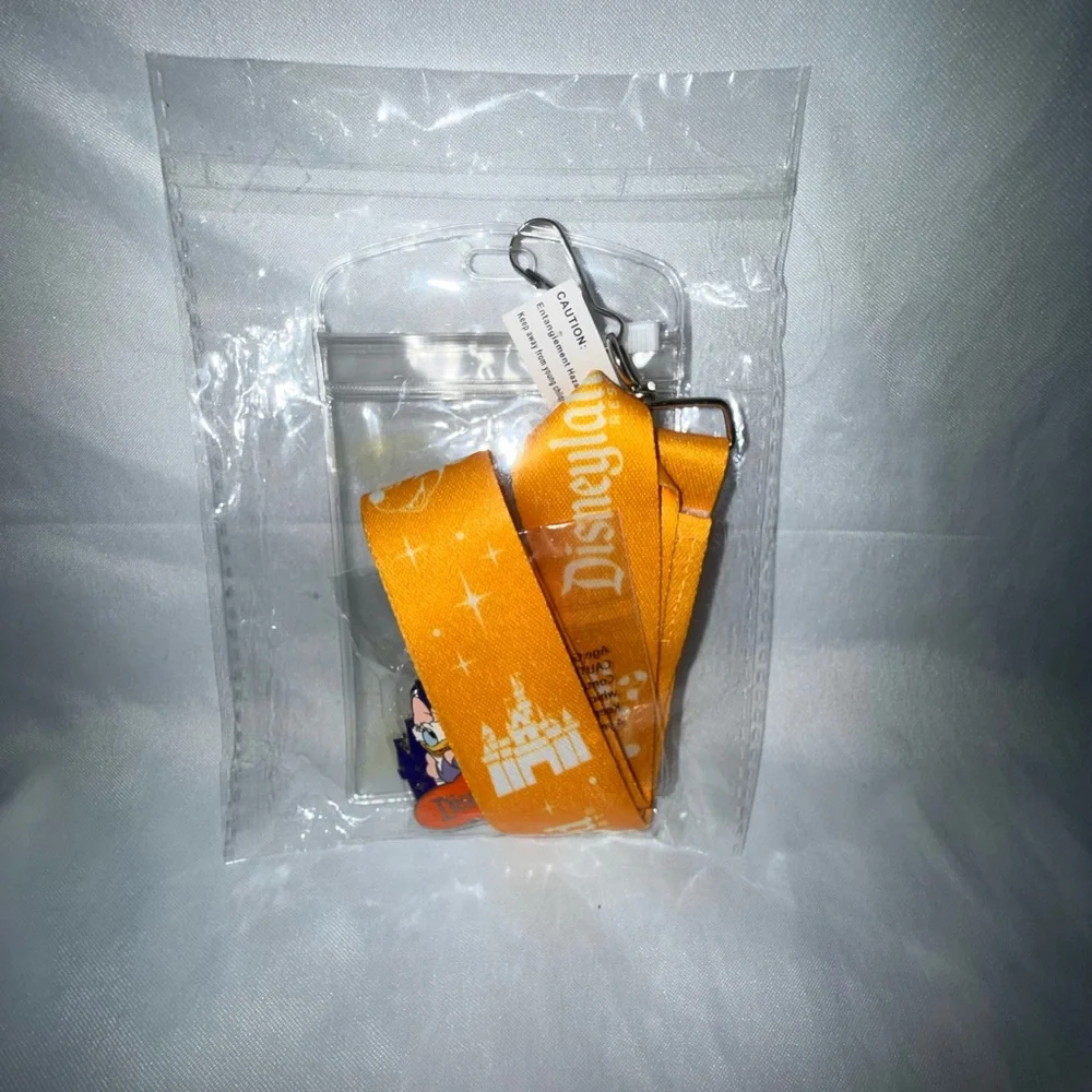 Disney Orange Printed Lanyard with Clear ID Sleeve and Clip